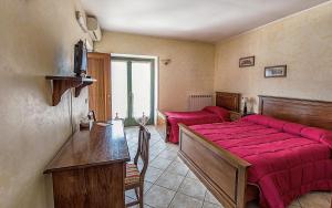 Postel nebo postele na pokoji v ubytování Hotel Casa Didé