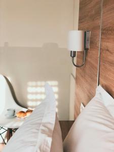 Ліжко або ліжка в номері Promenade Hotel