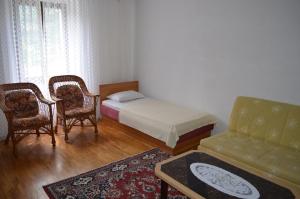 Postel nebo postele na pokoji v ubytování Apartments Drita