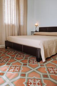 Letto o letti in una camera di Lamare cucina e dimore