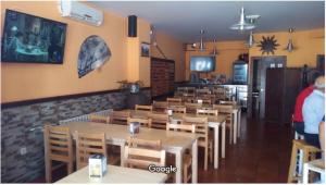 Ресторант или друго място за хранене в Casa Cesar