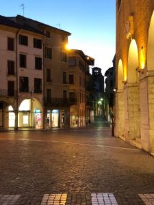an empty street in a city at night at Suite300 by Palazzina300 in Treviso