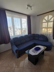 Ein Sitzbereich in der Unterkunft Villa Dorina