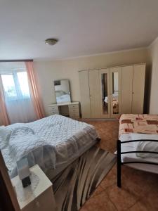 Ein Bett oder Betten in einem Zimmer der Unterkunft Villa Dorina