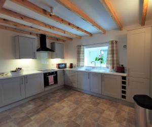 
A kitchen or kitchenette at The Trotting Mare Caravan Park - Adults Only
