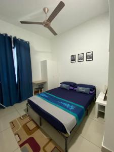 Säng eller sängar i ett rum på Bangi Almyra Suite