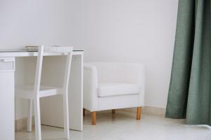 Letto o letti in una camera di Lamare cucina e dimore