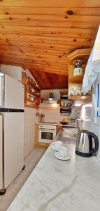 Kuchyň nebo kuchyňský kout v ubytování Cosy Country Style living
