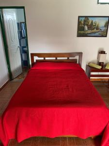 Postel nebo postele na pokoji v ubytování Hospedaje Rancho Guadalupe
