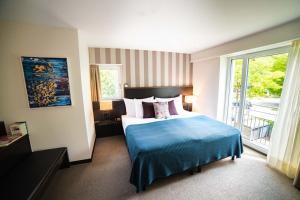 Katil atau katil-katil dalam bilik di Park Hotel Winterthur