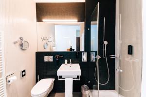 Bilik mandi di Park Hotel Winterthur