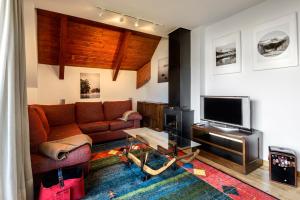 TV a/nebo společenská místnost v ubytování Apartamento Saliecho 3