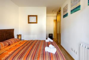 Postel nebo postele na pokoji v ubytování Apartamento Saliecho 3