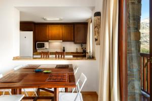 Kuchyň nebo kuchyňský kout v ubytování Apartamento Saliecho 3