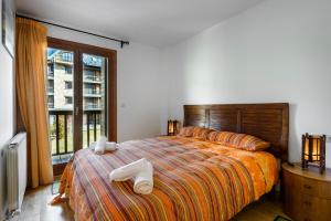 Postel nebo postele na pokoji v ubytování Apartamento Saliecho 3 + 33 fotografií