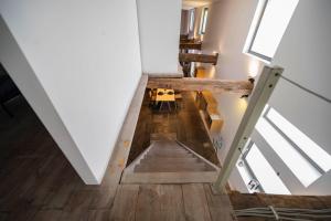 a view from the top of the stairs in a house at L'atelier de Liège: Tranquillité & Effervescence in Liège +11 photos