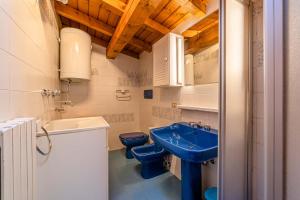 Koupelna v ubytování Tizzi Home