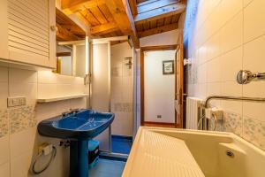Koupelna v ubytování Tizzi Home
