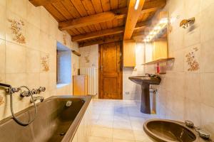 Koupelna v ubytování Tizzi Home