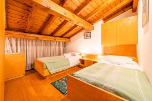 Postel nebo postele na pokoji v ubytování Tizzi Home