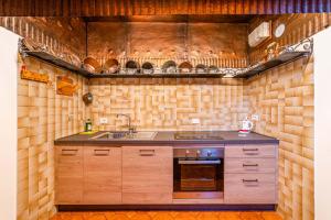 Kuchyň nebo kuchyňský kout v ubytování Tizzi Home