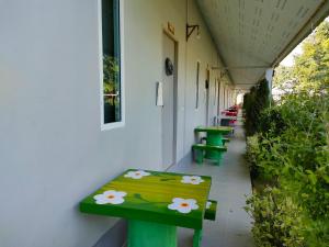 Fotografie z fotogalerie ubytování บ้านไม้หอมบูติค สวนผึ้ง v destinaci Ban Bo Wi