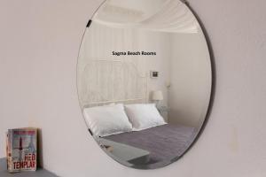 Cama o camas de una habitación en Sagma Beach Rooms