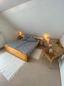 מיטה או מיטות בחדר ב-Haus Windjammer