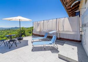 Balkón nebo terasa v ubytování Casa di nonna Ines 1 - Hideaway in Monferrato con Vista sulle Colline, Solarium e Piscina