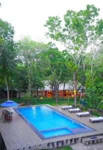 Bazén v ubytování Vaana Resort nebo v jeho okolí