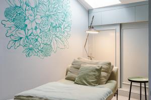 Postel nebo postele na pokoji v ubytování Bello!Lake Como Suites