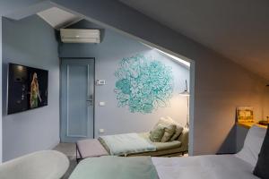 Postel nebo postele na pokoji v ubytování Bello!Lake Como Suites