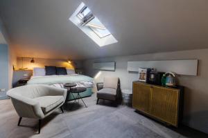 Postel nebo postele na pokoji v ubytování Bello!Lake Como Suites