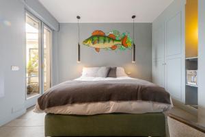 Postel nebo postele na pokoji v ubytování Bello!Lake Como Suites