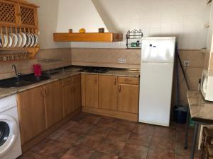 Kuchyň nebo kuchyňský kout v ubytování Casa Estribo