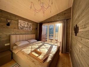 Кровать или кровати в номере Chill Village Fiagdon