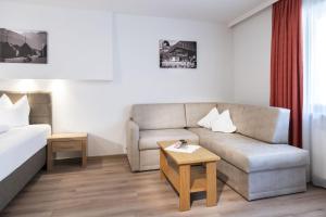 Posteľ alebo postele v izbe v ubytovaní Hotel Neuwirt