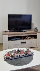 تلفاز و/أو أجهزة ترفيهية في Apartman Lola, Divcibare