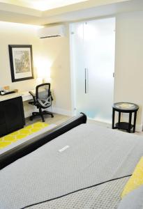 Katil atau katil-katil dalam bilik di Mariners Hotel