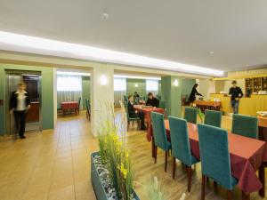 Restoran või mõni muu söögikoht majutusasutuses Arabella Hotel