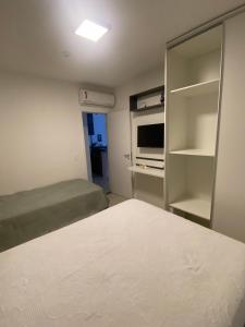 Ένα ή περισσότερα κρεβάτια σε δωμάτιο στο Guarajuba - Paraíso dos Coqueiros +29 φωτογραφίες