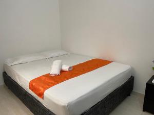 Cabaña Gaia Rodadero客房内的一张或多张床位