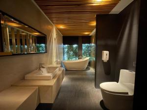 Ett badrum på Roppongi Motel - Dalian