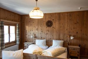 Postel nebo postele na pokoji v ubytování Alpina Hotel-Apartments