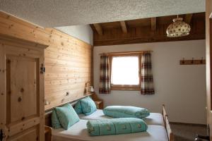 Postel nebo postele na pokoji v ubytování Alpina Hotel-Apartments