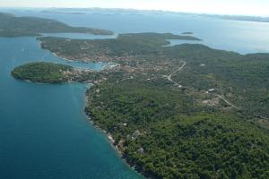 an aerial view of a group of islands in the water at Guesthouse Lidija in Kukljica