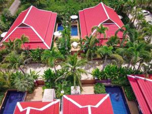 an aerial view of a house with red roofs at Boutique Resort Private Pool Villa - SHA Extra Plus in Ban Pa Khlok