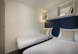 Maistra Camping Valkanela Mobile homes客房内的一张或多张床位