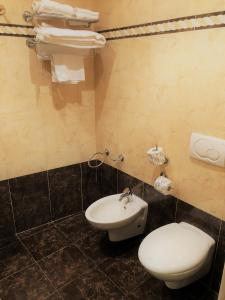 Koupelna v ubytování Hotel La Noce