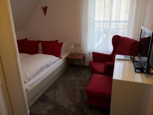 Ein Bett oder Betten in einem Zimmer der Unterkunft Waldhaus an de Miälkwellen